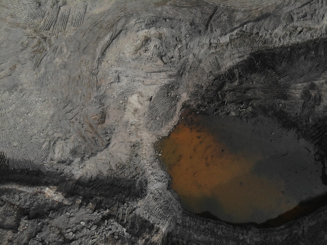 coal mining trucks at open